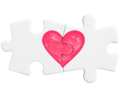 two puzzle pieces fitting together with a heart linking them